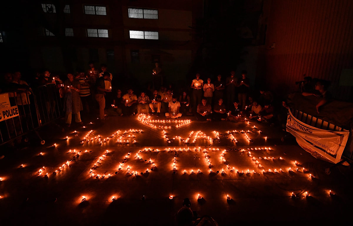 Doctors and health workers light candles depicting "We Want Justice" at the RG Kar Medical College and Hospital against the alleged rape and murder of a trainee woman doctor inside the hospital premises, in Kolkata, Wednesday - PTI
